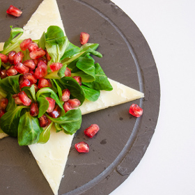 Ensalada de granada, canónigos y queso manchego semicurado D.O.P. Las Terceras
