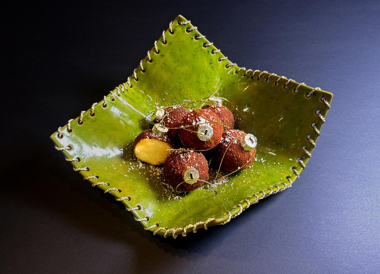 Christmas appetizer of Las Terceras Manchego cheese D.O.P. balls coated in spices