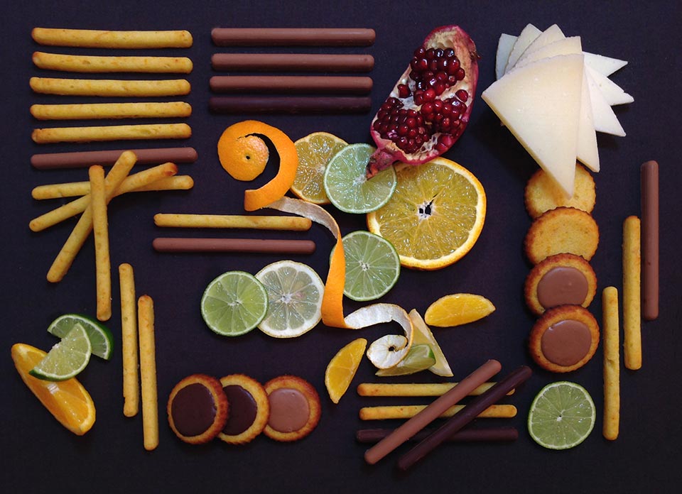 Medallones y canutillos de queso Las Terceras con naranja, bañados de chocolate