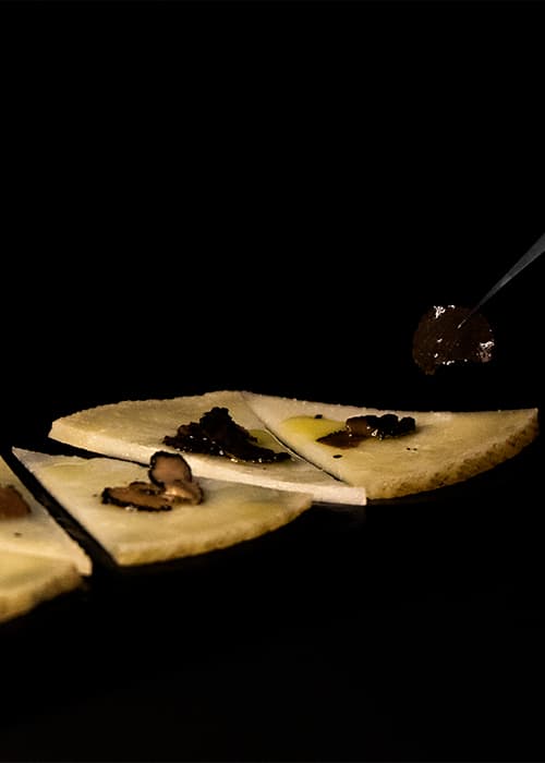 Manchego cheese with black truffle