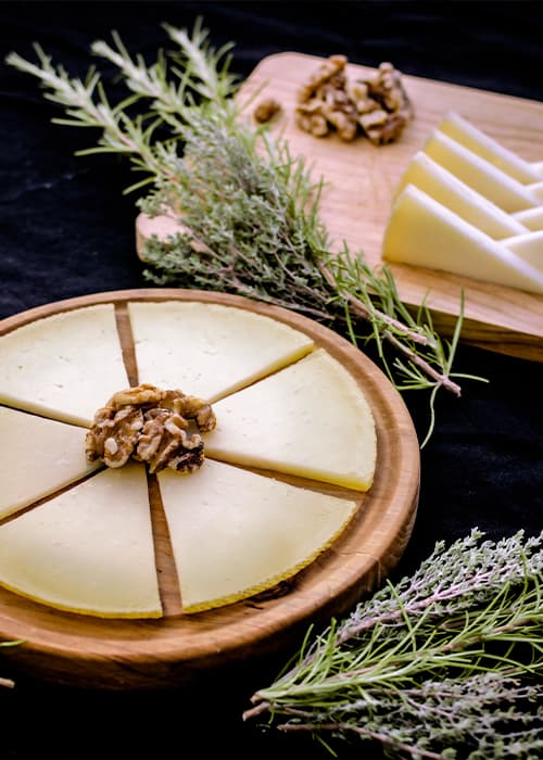 Aromatic Manchego cheese board with walnuts