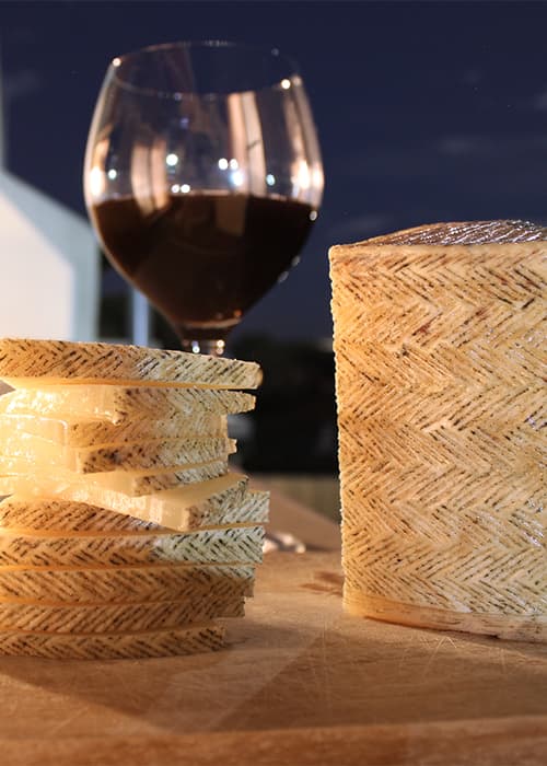 Manchego cheese with red wine