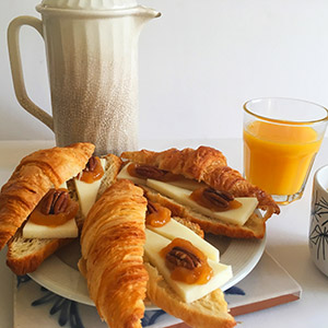 Croissants filled with apricot with white chocolate jam and Becerril Tender Cheese
